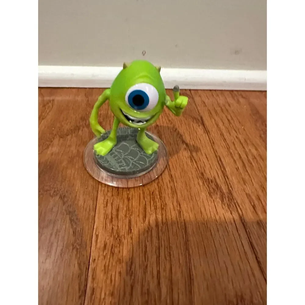 Disney Infinity figures Jack Sparrow, Monsters Inc, and Wreck it Ralph
